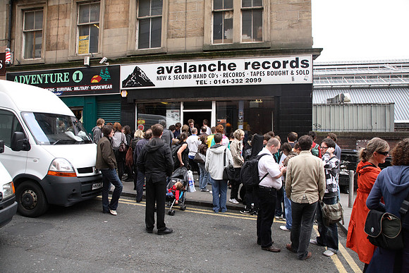 Fans Watch From Outside The Shop